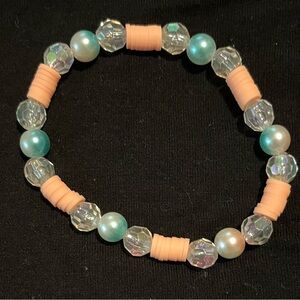 Handmade peach and blue beaded bracelet